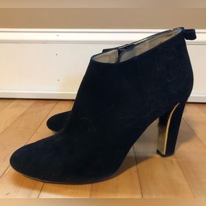 Great pair of black suede Kate Spade booties with gold and bow accents 9.5